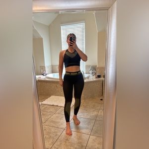 Gym shark top and bottom  bottom is in small size and the top is medium size.